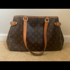 Beautiful 9.5 X 18 inch authentic Louis Vuitton handbag.